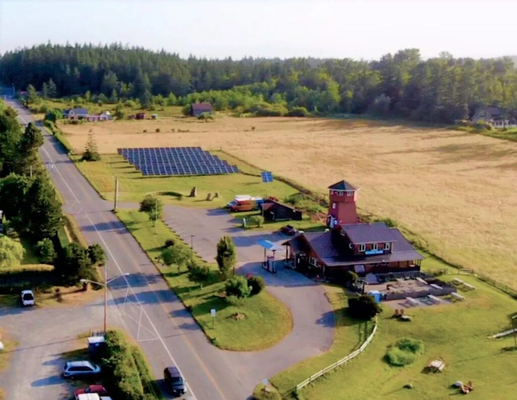 Guemes Island General Store with solar panels, offering local organic food and community gathering space.