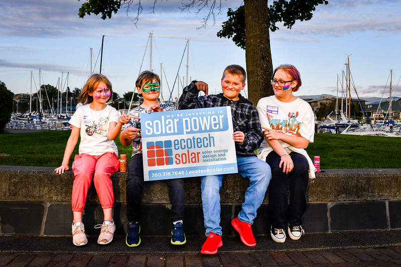 Kids with Ecotech Solar sign